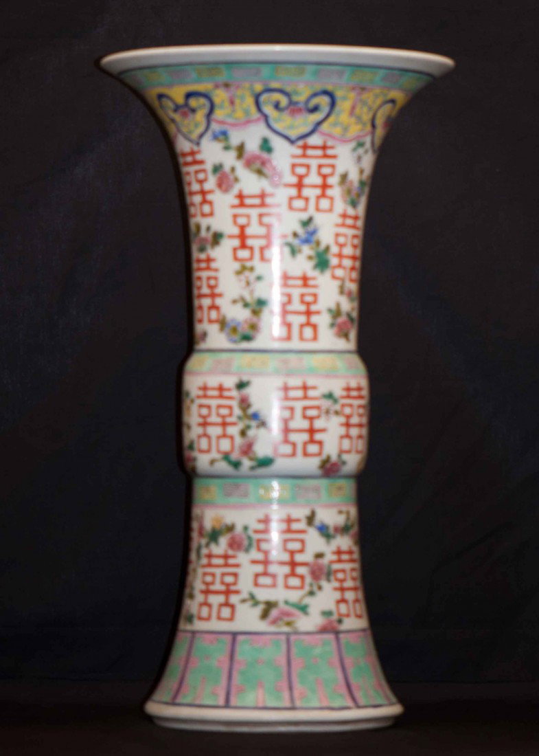 A Chinese Polychrome Beaker: 19th. C., 21" tall and 11.25" wide.