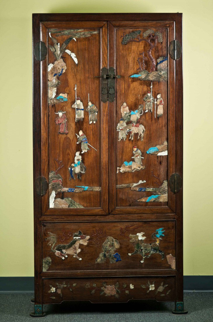 A Large Chinese Rosewood Cabinet Onlaid with Preci: It's made of rosewood, the four feet are mounted in cloisonne, and the cabinet is onlaid with hardstones, torquoise stones, mother-of-pearl, etc., 18th. C., 64.5" tall, 32.25" wide and 15.25" deep. Pl