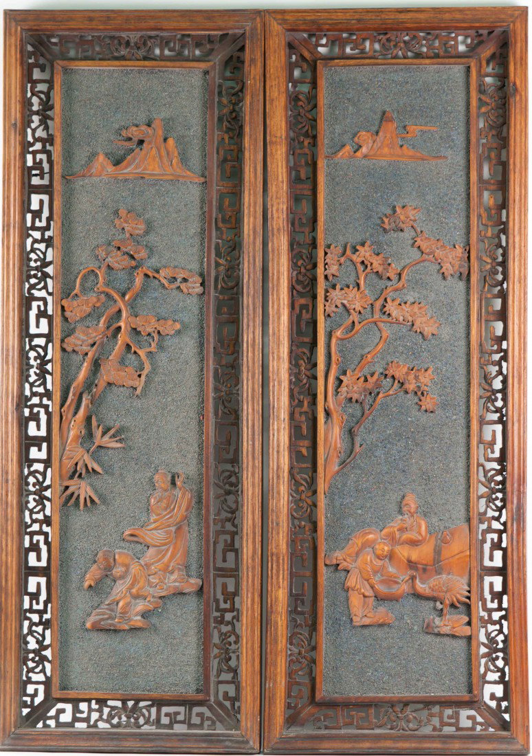 A Pair of Chinese Framed Plaque in Box Wood Carvin: 36.75" tall and 13" wide.