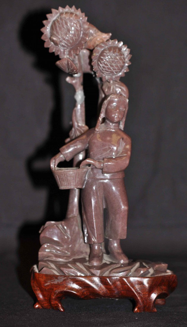 A Chiese Carved Purple Stone Cultural Revolutionar: 1960's, 8.5" tall with the stand, 4.25" wide and 2.5" deep. It's repaired on the stem of the sunflower.
