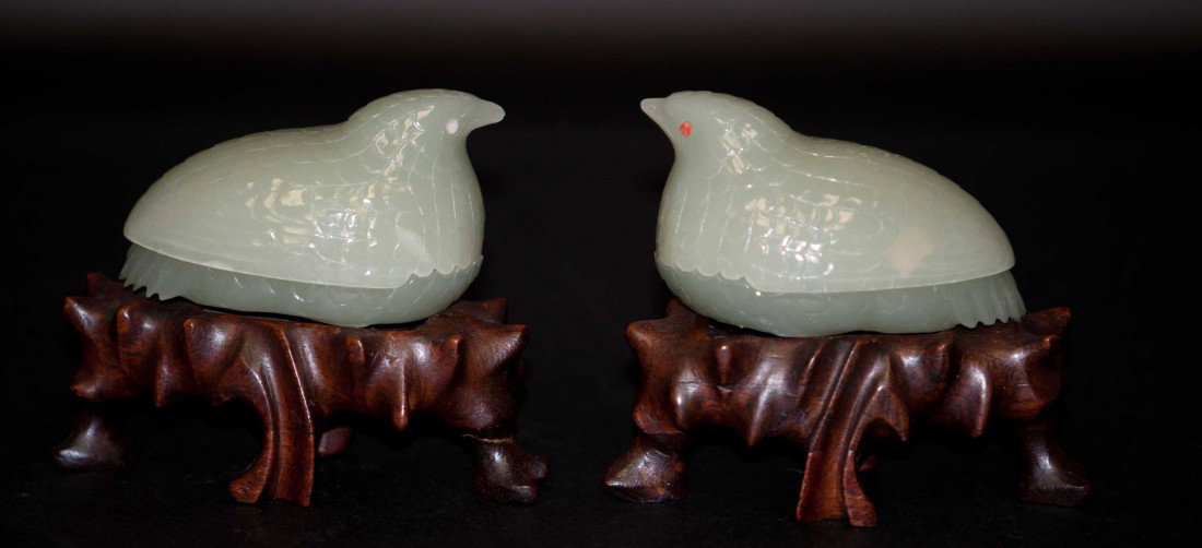 Pair of Chinese Celadon Jade Bird-form Boxes: The birds are 3.25" long and 1.8" tall. 20th. C.. In good condition, one eye is missing the precious stone.
