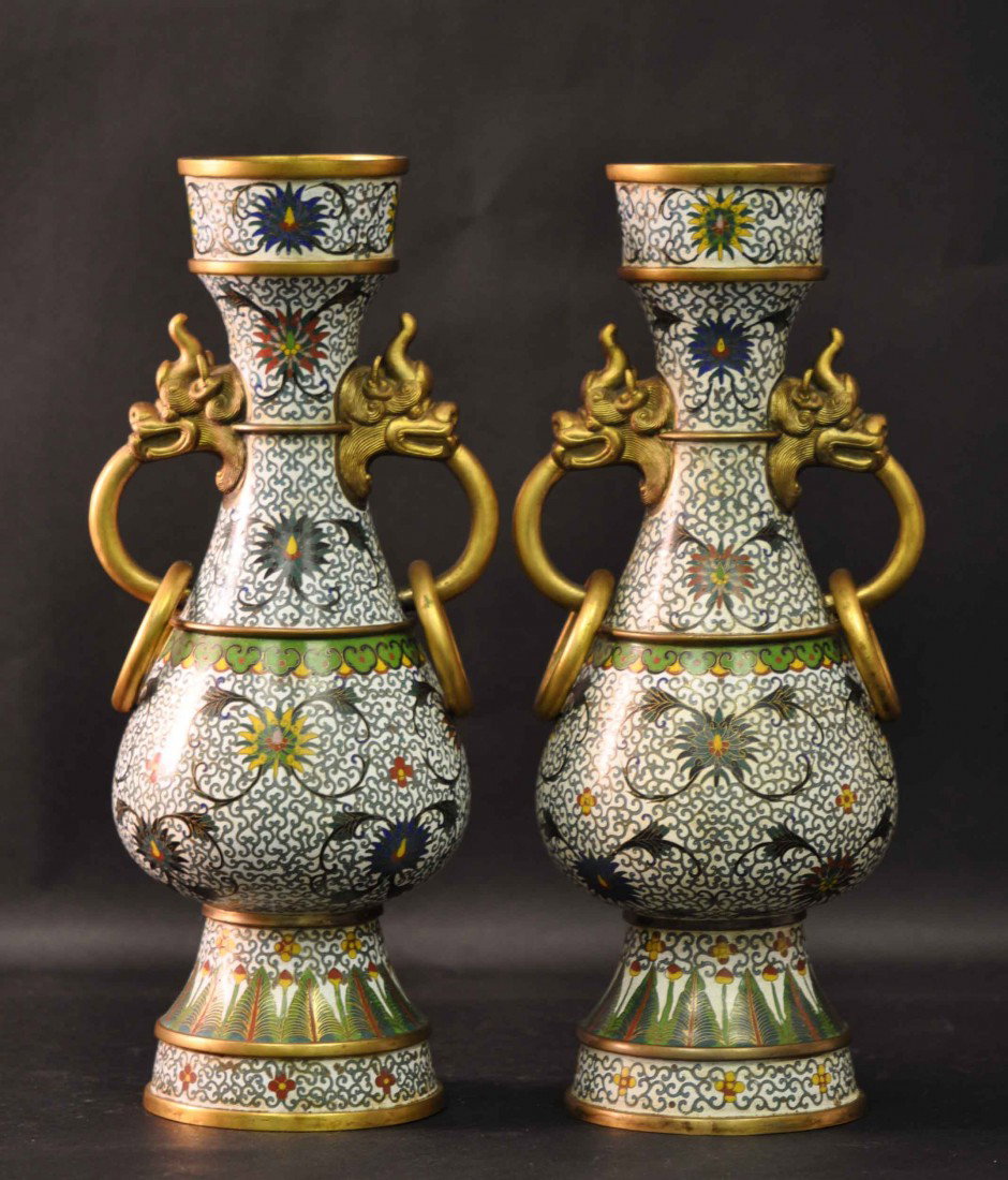 Pair of Chinese Cloisonnee Beakers with Two Ears w: The beakers bear marks on the bottom. They measure 14" tall. Good condition.