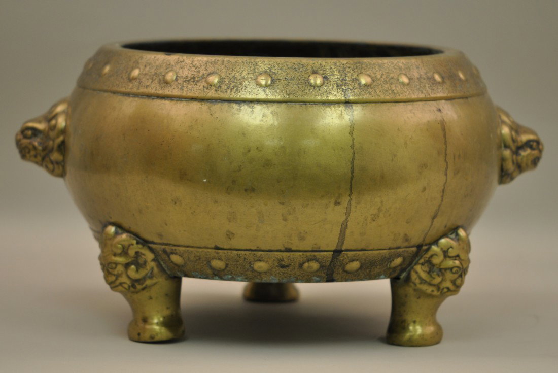 Chinese Large Bronze Incenser w/Lion Masks: 19th. C. 13.5" on the widest part and 7.75" tall. Good condition.