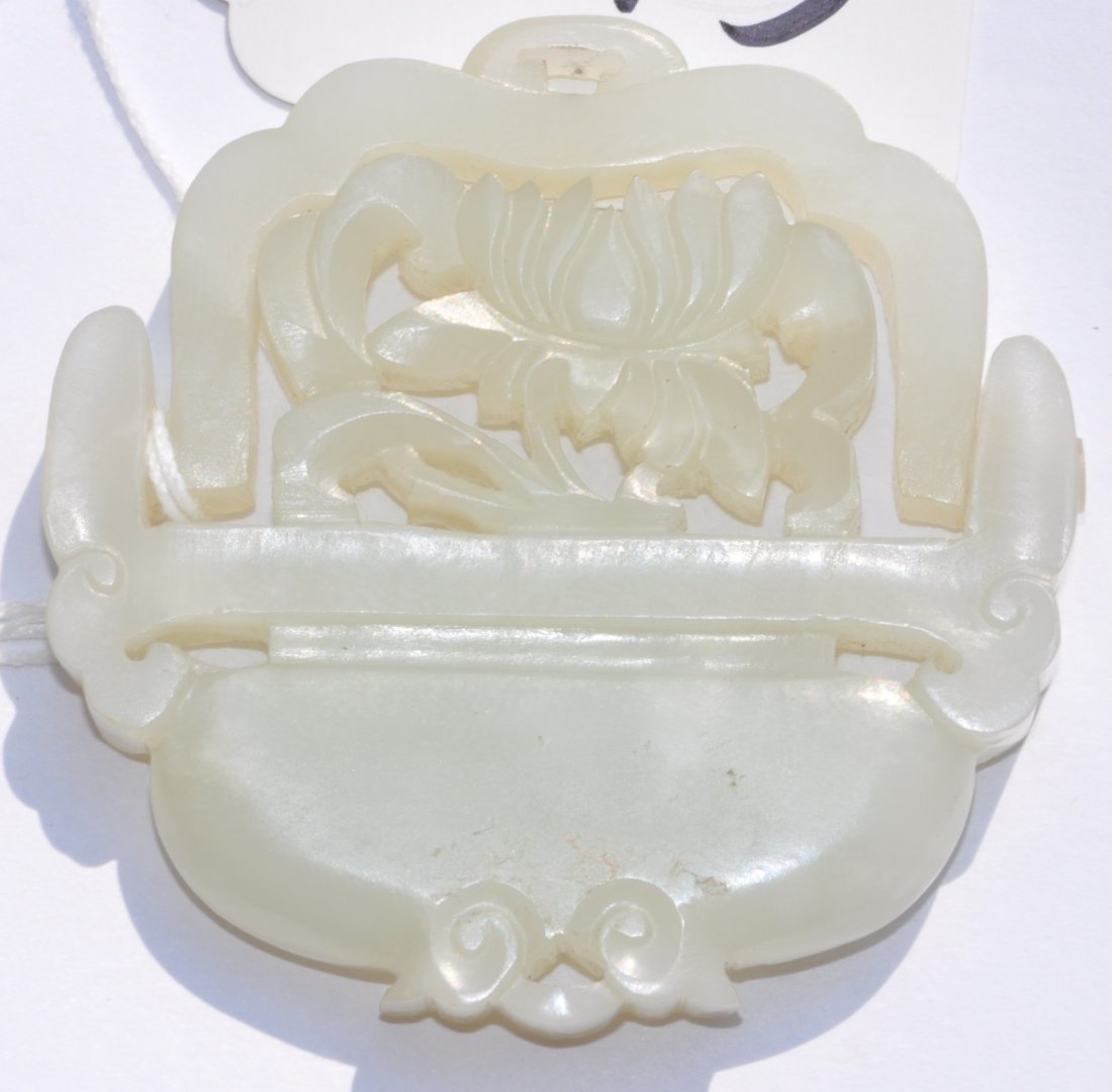 Chinese Flower Basket White Jade Plaque: 2.15" (5.4cm) in the diameter and 0.4" (1cm) thick. The photos with white paper are taken under natural light. Good condition. 19th. c.