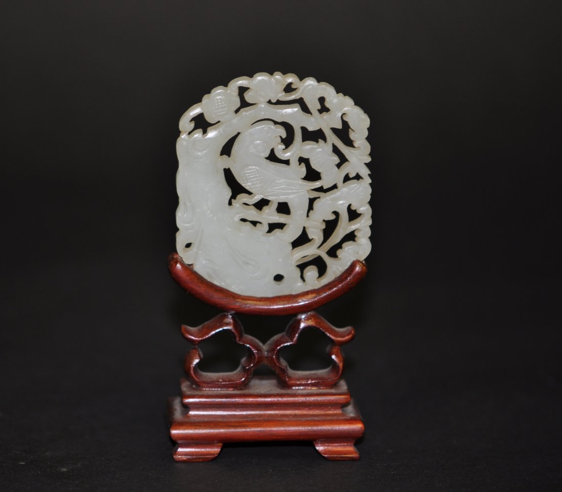 Chinese White Jade Plaque in Birds: 2.25" (5.7cm) across. 19th. C. Good condition. The stand is only for display, not for sale. Please be aware，我們不使用軟件改變玉į