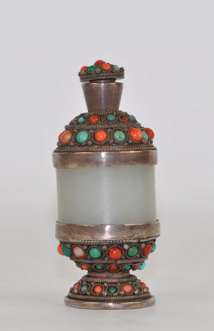 Chinese White Jade Snuff Bottle Wrapped in Silver and J: Inset with semi-precious stones. 2.75" (7 cm) tall. 18th. 19th. C. Good condition.