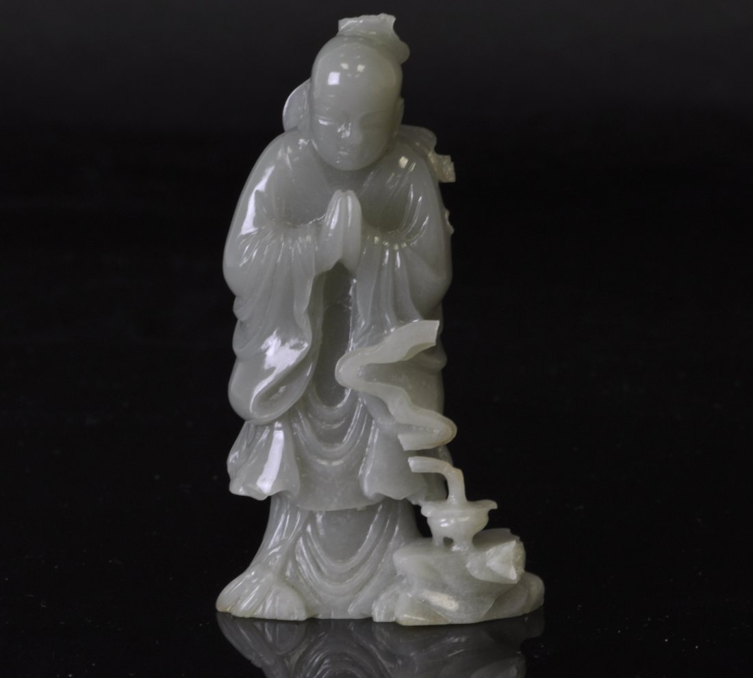 Chinese White Jade Monk: 4" (11cm) tall. 19th. C. Good condition with a chip on the smoke of the incense burner.