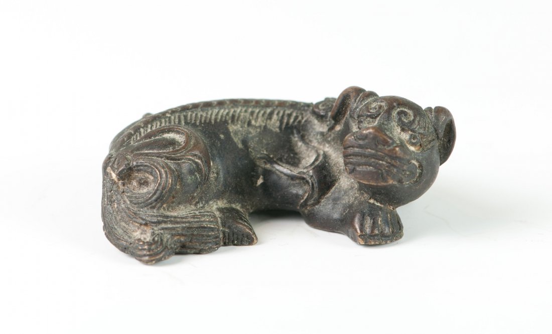 Chinese Bronze Foo Dog Paper Weight: Cast in Foo Dog form, Ming or Yuan Dynasty. 2.25" (5.5cm) long.