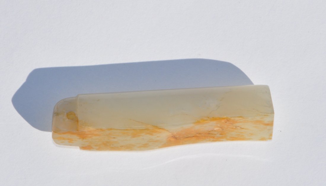 Chinese White Russet Jade Ling Guan 1: 帶皮白玉翎管. 2.625" (6.6cm) long. 19th. C. Good condition. Please note: we DO NOT use any softwares to change the jade color and all photos in white are taken unde