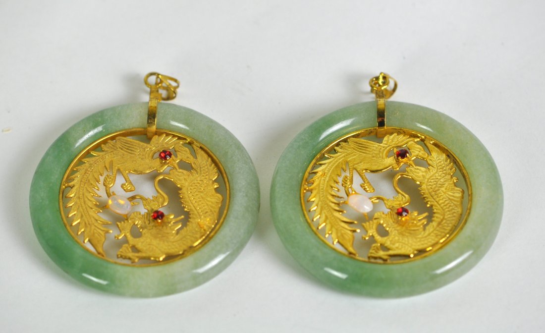 Chinese Pair Stone Plaques: Possibly jadeite. 2.25" (5.8cm) across. 20th. C.. Good condition.