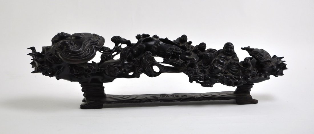 Chinese Rosewood Carving: Carved in Buddha and Ling Zhi plant. 22"(56cm) long and 6.5" (16.5) tall. Good condition.