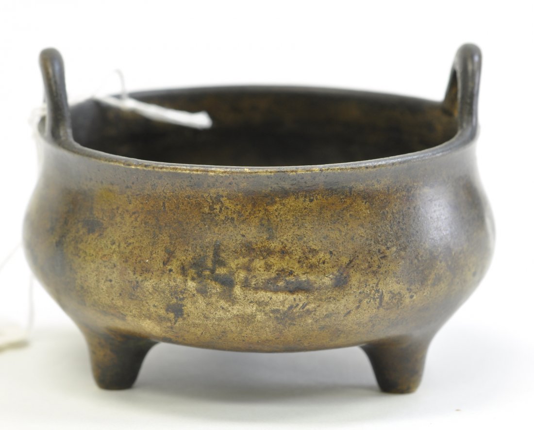 Chinese Bronze Incense Burner: It is gilt with age wears. 4" (10cm) across and 3" (7.5cm) tall. Weight: 298 grams. Marked "宣德“. 18th. C. Good condition with age wears.