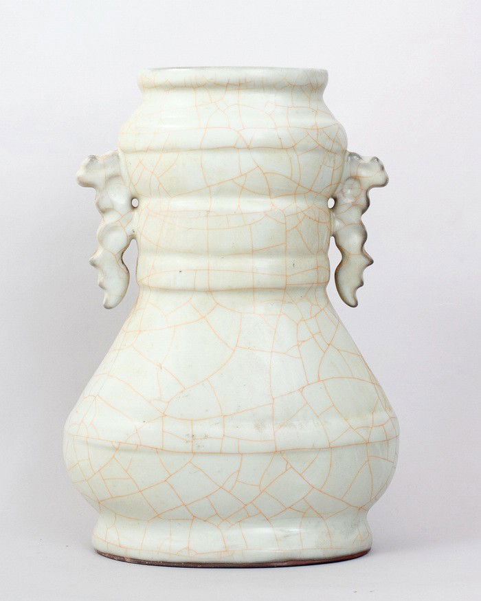 FINE CHINESE GUANYAO PORCELAIN VASE: TWO DRAGON HANDLED WHITE GROUND VASE WITH RED CRACK PATTERN.14"H,9"W. PRIVATE COLLECTION GROSSE POINTE,MICHIGAN.