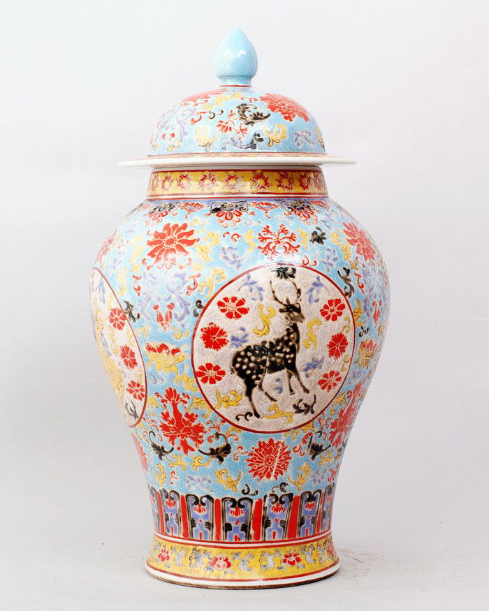 CHINESE FAMILLE ROSE PORCELAIN JAR: A FINE COVERED JAR WITH FLORAL DESIGN,FLOWERS AROUND FOUR DEER. 17.5"H,8.5"DIA. THREE QIANLONG SEAL MARKS CIRCLED BY MANY CHINESE CHARACTERS IN UNDERGLAZE BLUE IN THE BOTTOM.