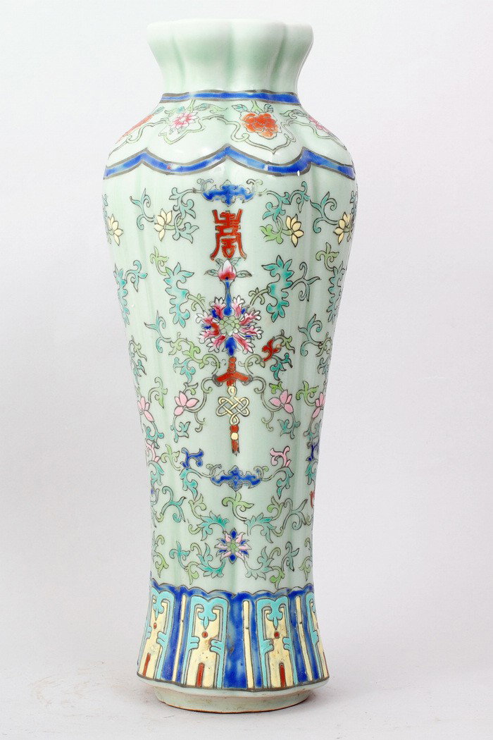 CHINESE FAMILLE ROSE PORCELAIN VASE: PAINTED WITH FLORAL,BATS AND CHINESE LUCKY SYMBOLS IN GREEN,RED,BLUE, YELLOW. BASE ON LIGHT GREEN GROUND. 15"H,9"DIA. FOUR CHARACTER FOR YONGZHENG PRODUCTION IN UNDERGLAZE BLUE ON BOTTOM.