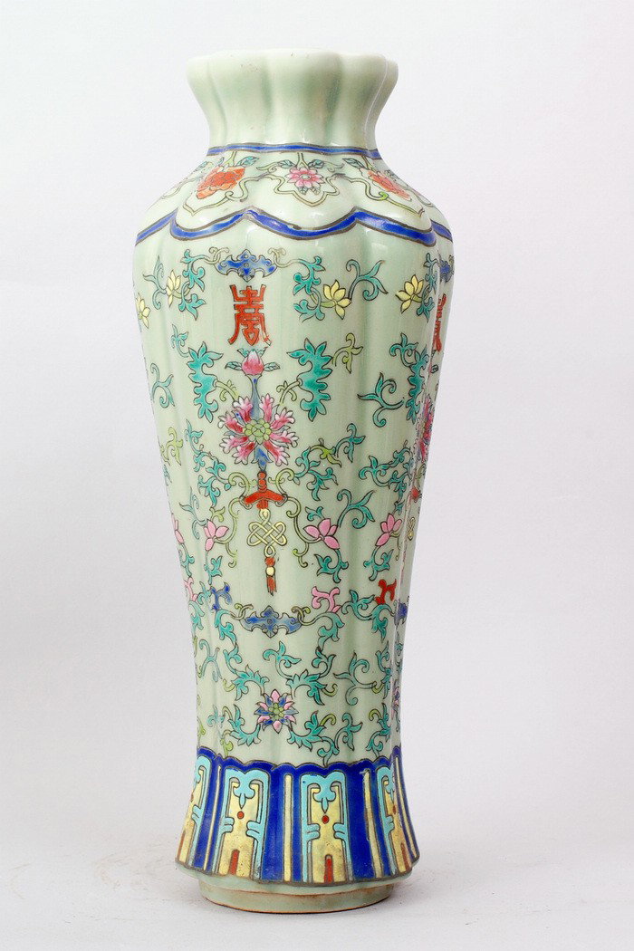 CHINESE FAMILLE ROSE PORCELAIN VASE: PAINTED WITH FLORAL,BATS AND CHINESE LUCKY SYMBOLS IN GREEN,RED,BLUE, YELLOW. BASE ON LIGHT GREEN GROUND. 15"H,9"DIA. FOUR CHARACTER FOR YONGZHENG PRODUCTION IN UNDERGLAZE BLUE ON BOTTOM.