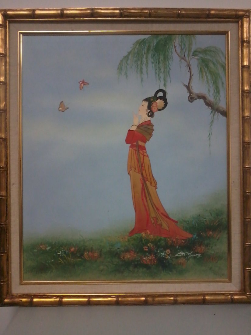 Very fine art work in a frame by St.Young on fab: Very fine art work with combination of oil paint,embroidary and attached bamboo depicting a beautiful lady in a lawn under a tree watching butterflies ,L.24",W.20".