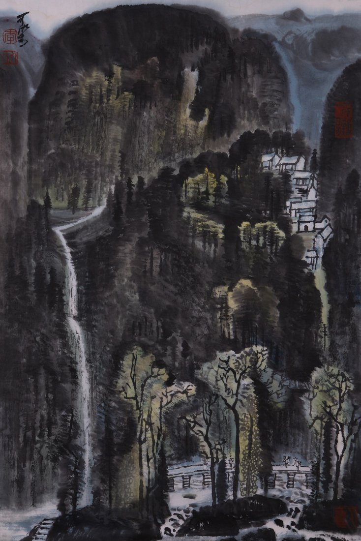A very fine Chinese painting by Li Keran: Ink and color on paper by Li Keran depicitng a landscape of mountains ,waterfalls and houses ,inscribed and signed with 3 seal marks.17.7"X27.2".A part of a private collection of a veteran in Michigan
