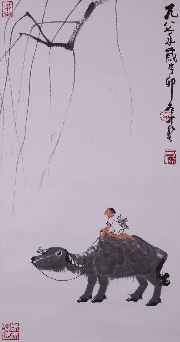 A very fine Chinese paintng by Li Keran: Ink and color on paper by Li keran to depict a boy on a buffalo,inscribed and signed with 4 seal marks,14.2"X27.6".A part of a private collection of a veteran in Michigan.