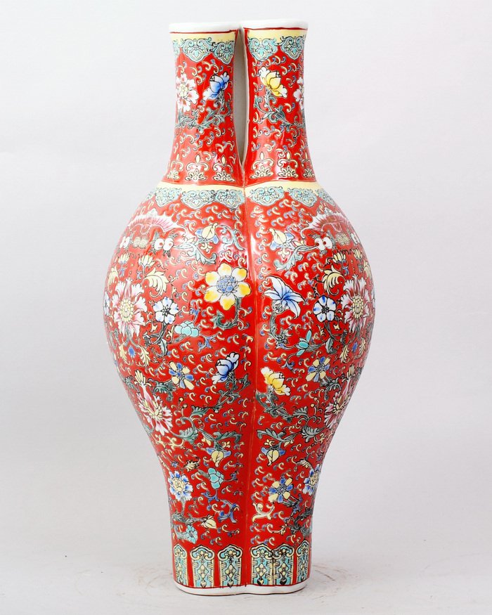 A FINE CHINESE FAMILLE ROSE TRIPLE-TEAM VASE: THREE BOTTLES COMBINE TOGHTHER,FINELY RAISE DECORATIONS ABOUT BATS AMONG THE FLOWERS.15.5"H,7.5"W. SEALED MARK ON BOTTOM,FOUR CHARACTER QIANLONG PRODUCTION.