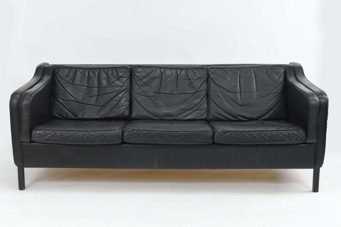 BORGE MOGENSEN STYLE THREE SEAT SOFA BY STOUBY: Dimensions: H 27.5" x W 75" x D 33" Condition: Mild upholstery wear, creasing, moderate areas of wear to piping, light scuffs to upholstery, nicks, dings, and chips to legs.