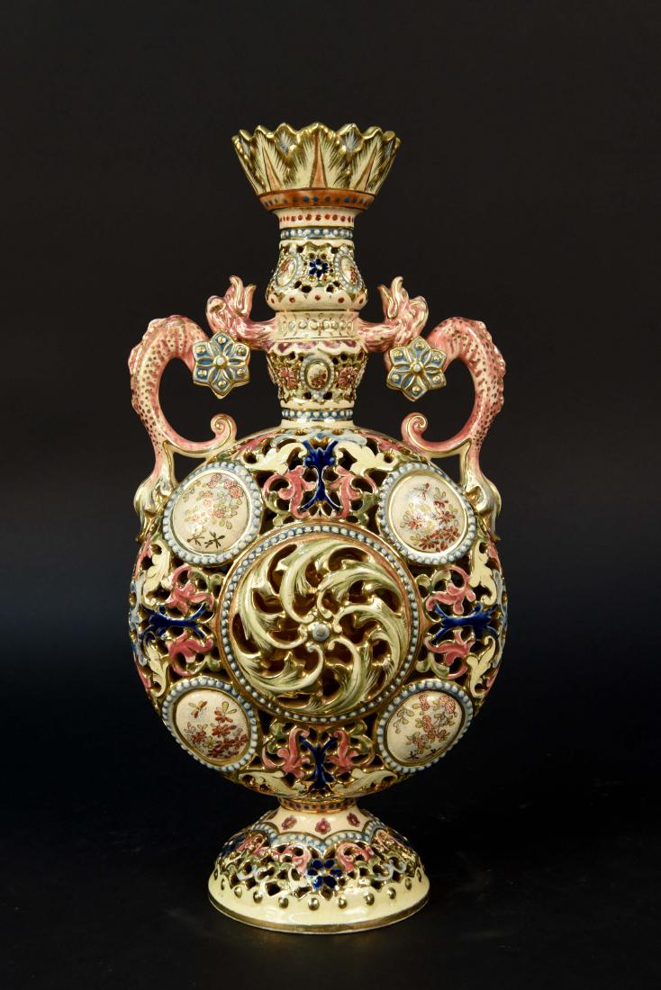 ATTR. ZSOLNAY STYLE PECS OPENWORK PORCELAIN VASE: Stamped 1545, 39, an another blue mark Dimensions: H 14.5" x W 7" Condition: Crazing. Chip on bottom.