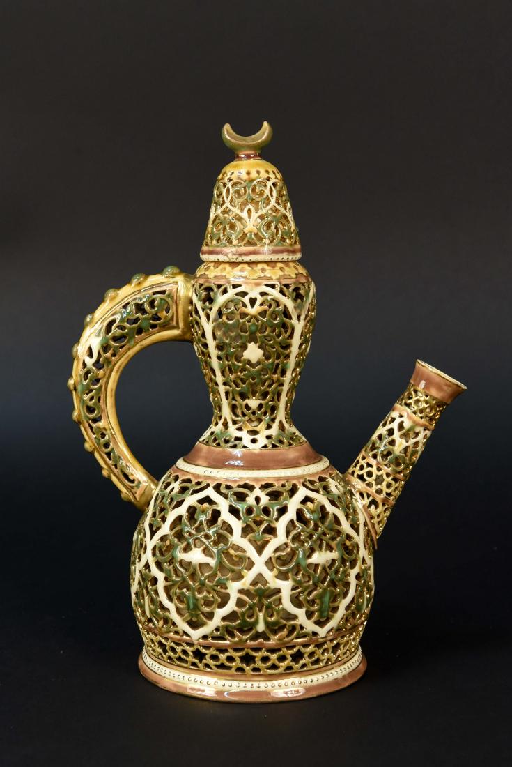 ZSOLNAY PECS PIERCED PORCELAIN TEAPOT: Zsolnay markings under. Dimensions: H 10.5" x W 7.5" Condition: Showing only light signs of age.