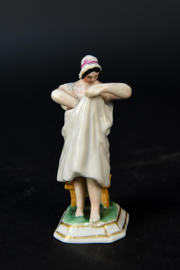SMALL PAINTED PORCELAIN NAUGHTY FIGURE (1 of 5)
