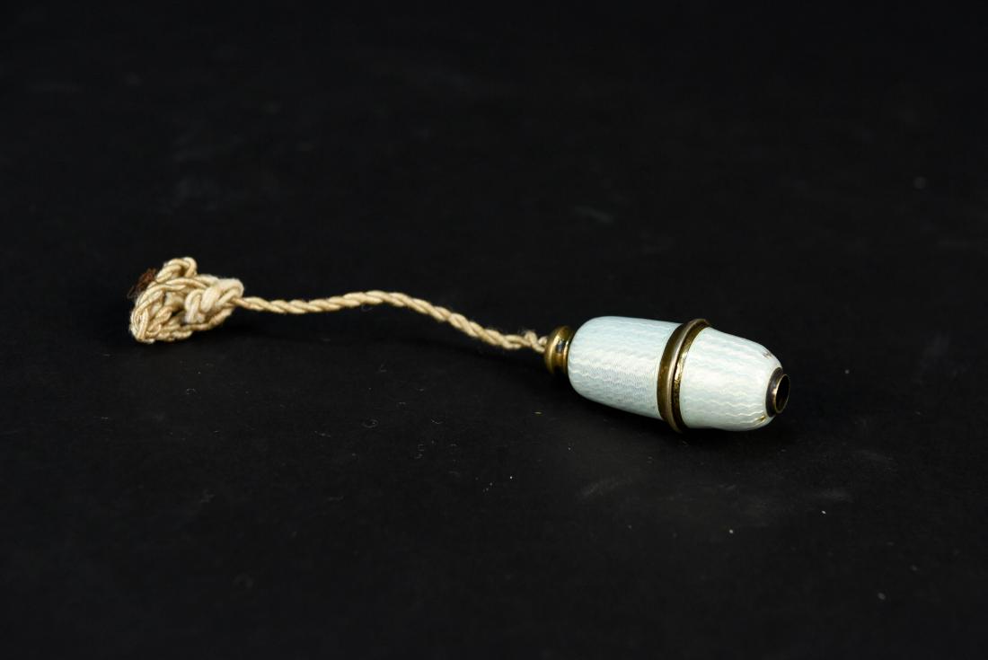 SMALL GUILLOCHE ENAMEL BUTLER'S BELL SWITCH: Dimensions: (Not incl. rope) H 1.75" x Dia. .75" Condition: Some damage to enamel. Brass could use polishing, missing button part