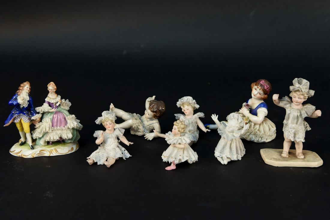 (8) PORCELAIN FIGURES INCL. CAPODIMONTE: One marked with N and crown to base. Dimensions: (Tallest) H 3.75" x W 2.5" x D 1.5" Condition: Break to one's porcelain "lace."