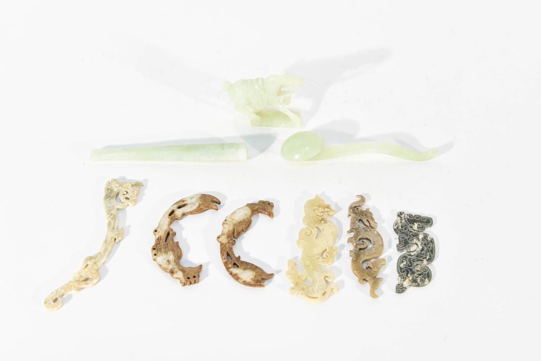 GROUPING OF CARVED JADE: Including scepter, cigarette tip, and horse. Dimensions: (Horse) H 2.5" x W 3" x D 1" Condition: Small chip to horse ear.