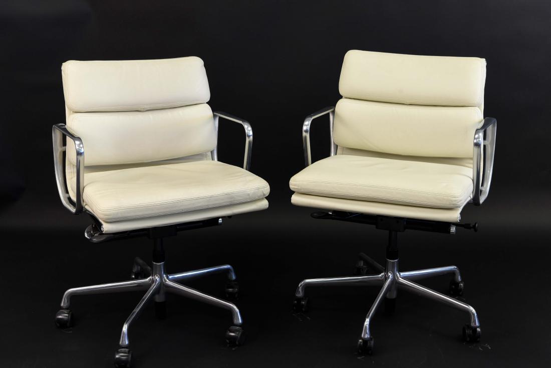 PAIR OF EAMES SOFTPAD ARMCHAIRS (1 of 10)