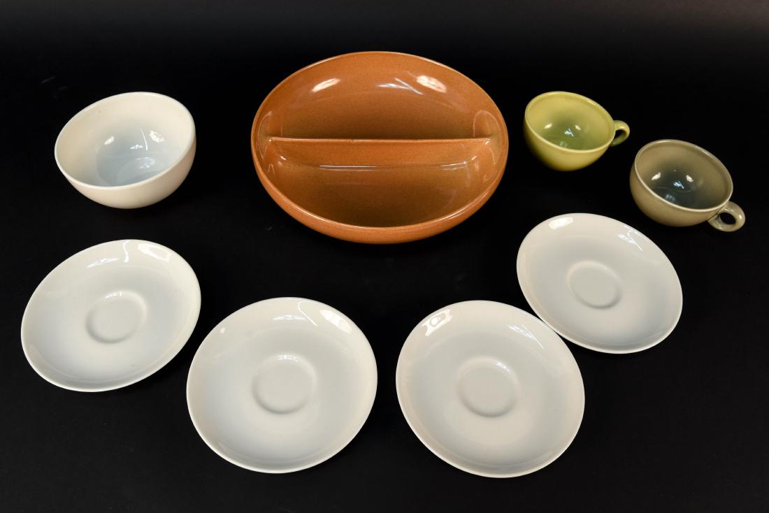 GROUPING OF RUSSEL WRIGHT IROQUOIS CASUAL CHINA: Includes (1) divided vegetable bowl, (2) cups, (4) saucers, and (1) deep soup bowl. Marked Iroquois casual China Russel Wright to bottoms. Dimensions: (Largest) H 2.5" x Dia. 10.25" Condition: No issu