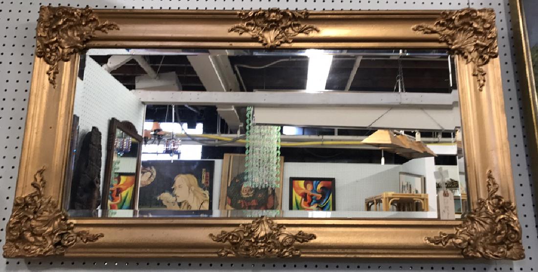 VINTAGE GOLD PAINTED MIRROR: Dimensions: H 25" x W 47" Condition: Piece of tape visible underneath paint.