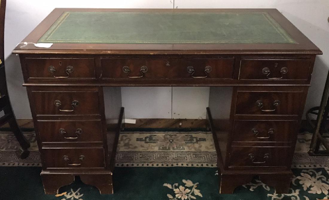 MAHOGANY DESK: Dimensions: H 30.5" x W 47.75" x D 23.75" Condition: Few scuffs and small loss to leather top. Some finish wear. Nicks and dings.