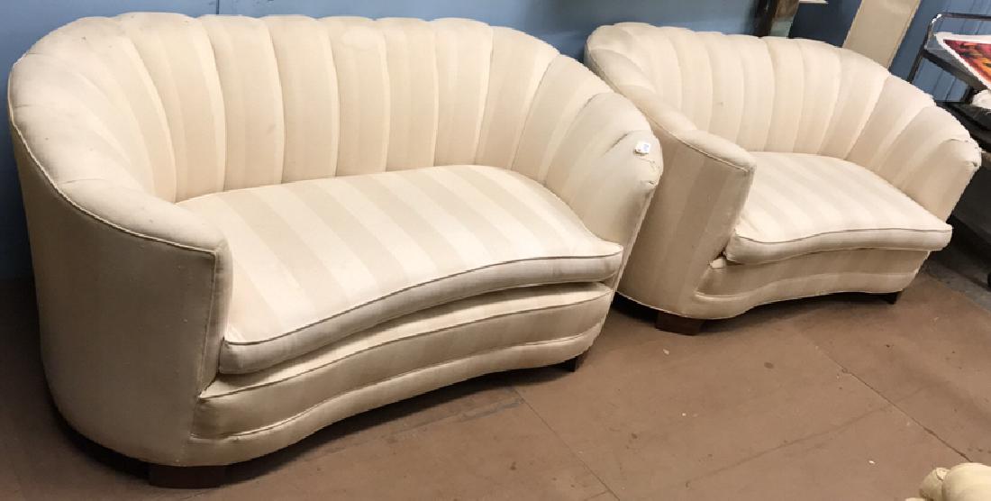 (2) CHANNEL BACK LOVESEATS: Dimensions: H 30" x W 68" x D 36.5" Condition: Some soiling to upholstery. Some nicks to feet.