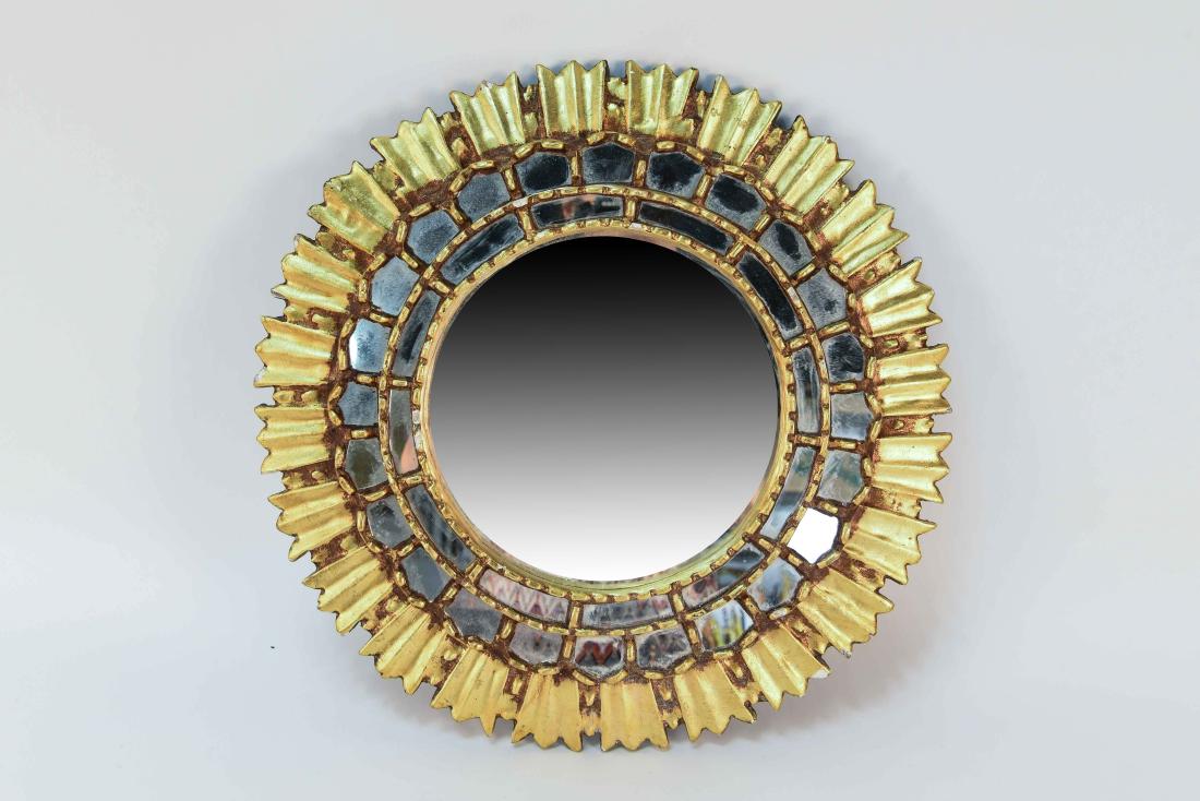 GILT SUNBURST MIRROR: Gilt wood. Dimensions: Dia. 18" Condition: Small losses throughout.
