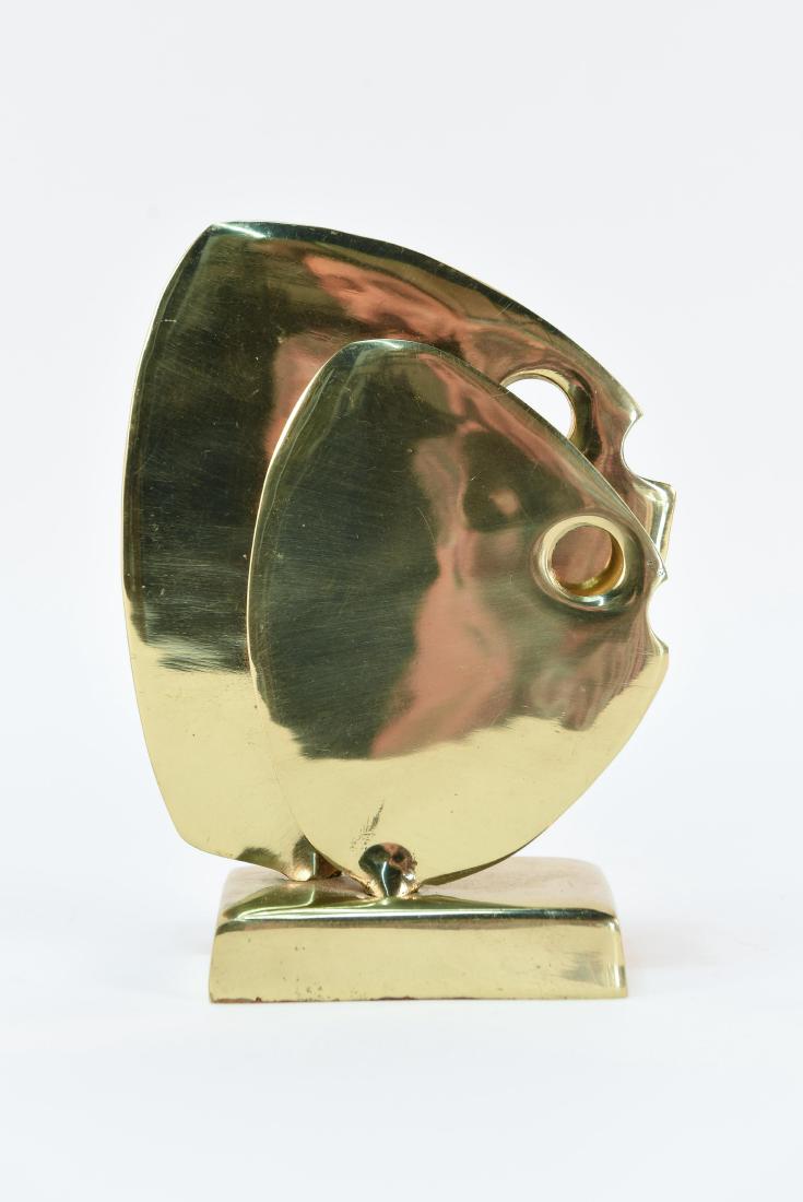 ABSTRACT BRASS FISH SCULPTURE: Unsigned. Dimensions: H 6" x W 4.5" x D 2.25" Condition: Some surface scratches. Smaller fish wiggles in place.