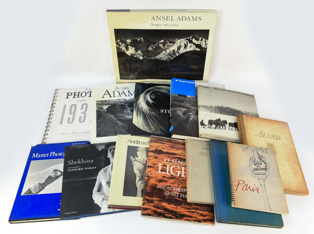 COLLECTION OF PHOTOGRAPHY BOOKS: Including: Master photographers, by Pat Booth, Shekhina, by Leonard Nimoy, Realms of light, by Ernst Haas, Ansel Adams, by Barry Pritzker, and more. Dimensions: H 14" x W 17.25" x D 1" (Largest book,