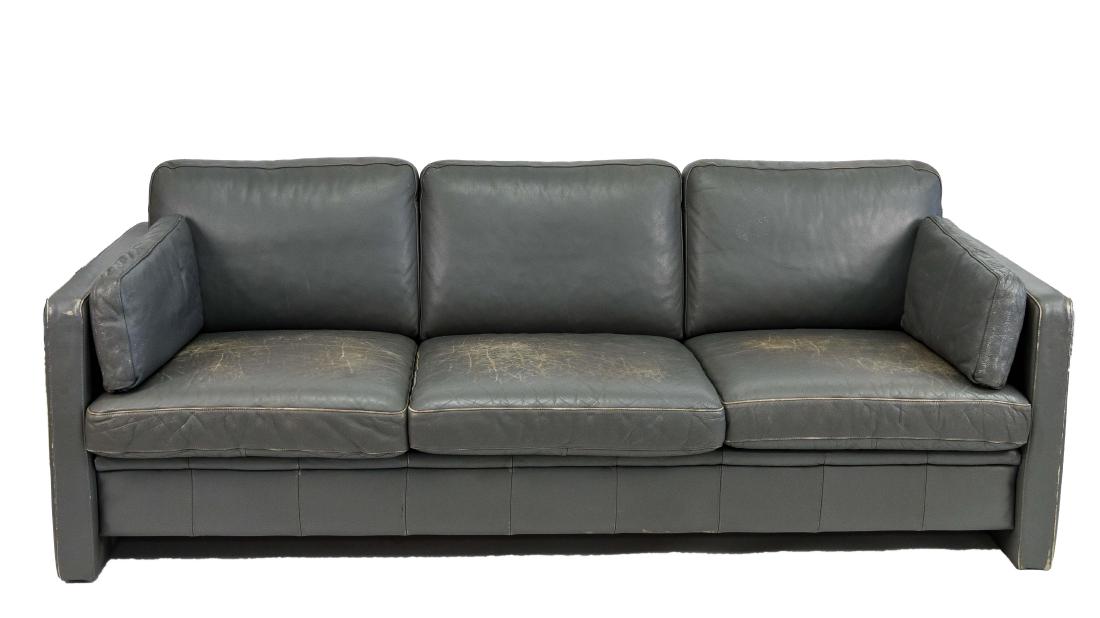 MOGENS HANSEN GRAY LEATHER 3-SEAT SOFA: Dimensions: H 30" x W 83" x D 35" Condition: Vintage wear consistent with age and use. Scuffs and creasing to leather.