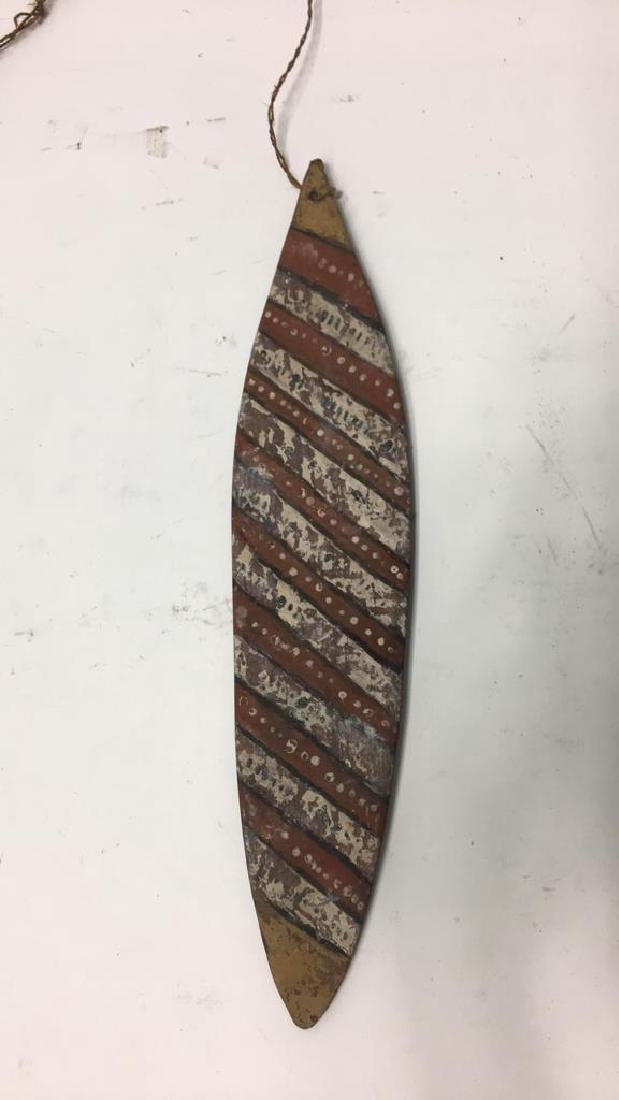 ABORIGINAL BULLROARER: Dimensions: H 13" x W 2.75" Condition: Some paint wear. Small chip to one tip.