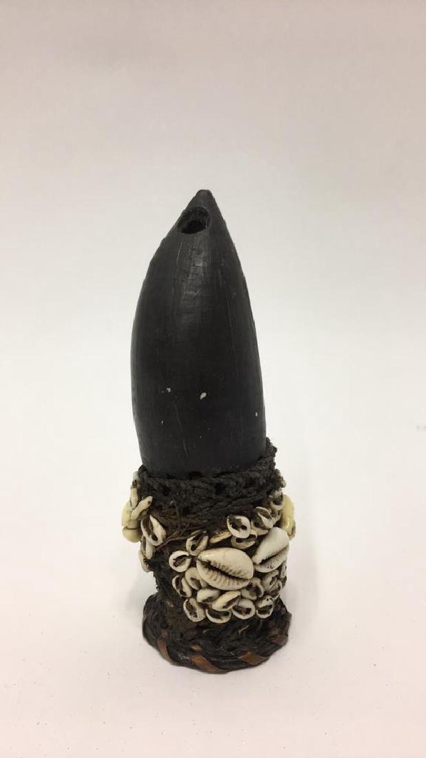 PAPUA NEW GUINEA SEASHELL ENCRUSTED PENIS SHEATH: Made with dwarf coconut wood, reserved for man killers (assassins). Dimensions: H 5.75" x Dia. 2" Condition: Light wear.