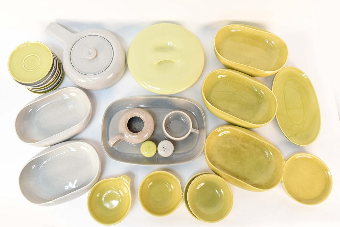 GROUPING OF RUSSEL WRIGHT DINNERWARE: (31) pieces. Dimensions: (Largest) H 4" x W 11.75" x D 8.25" Condition: Few are with chips. Crazing. One missing lid.