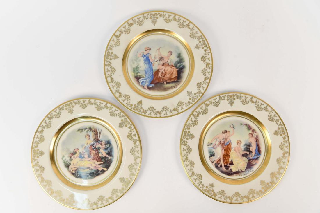 (3) ROYAL VIENNA PORCELAIN PLATES: With blue beehive marking underneath. Front design signed illegibly and marked Amsterdam. Dimensions: Dia. 10.25" Condition: Mild finish wear.