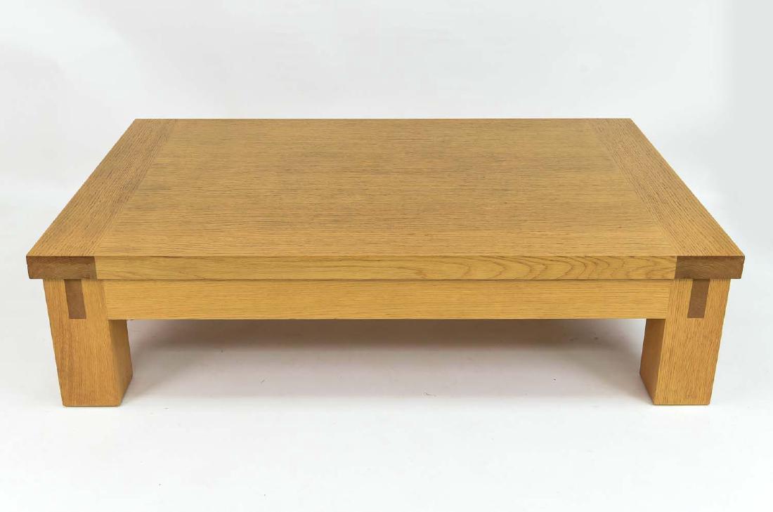 CHRISTIAN LIAIGRE; HOLLY HUNT COCKTAIL TABLE: American, white oak, 1990s, unmarked. Dimensions: H 16" x W 39" x L 62" Condition: Overall good and clean, some small veneer losses on corners of legs and edge, good original finish with some light bl