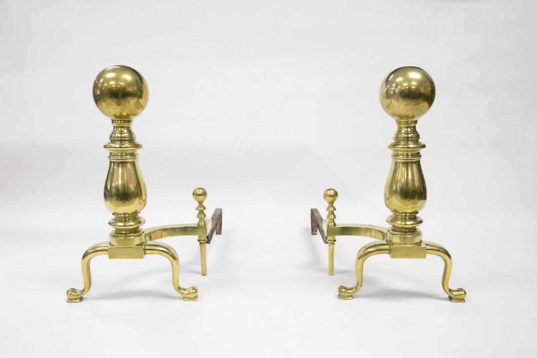 PAIR OF BRASS ANDIRONS: Dimensions: H 22" x W 27.5" x 12.75" Condition: Some tarnish.