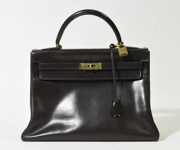 VINTAGE HERMES KELLY LEATHER HANDBAG: Dimensions: H (top of handle) 12.25" x W 12.75" x D 5" Condition: Very mild wear.