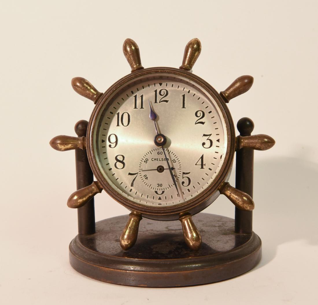 CHELSEA SHIP'S WHEEL CLOCK: Dimensions: H 5" x W 4.75" x D 4.25" Condition: Not tested. Mild tarnish.
