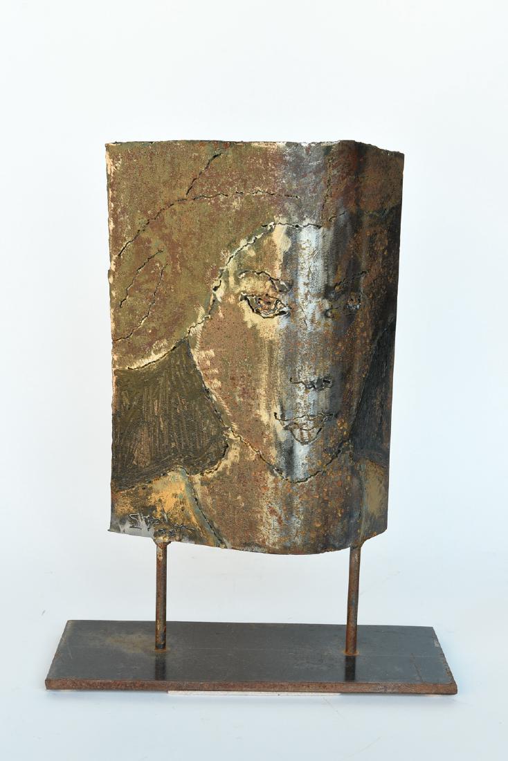 BRUTALIST STEEL SCULPTURE OF WOMANS FACE: Steel, signed illegibly (S. post?) lower left. Dimensions: H 18" x W 14" x D 5" Condition: As shown with light rust.