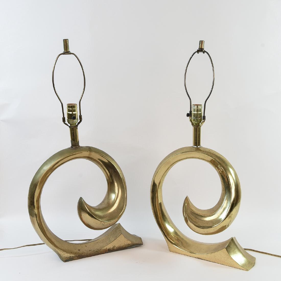 PIERRE CARDIN BRASS SWOOSH LAMPS: Dimensions: (to socket) H 19.5" x W 15" x D 6" Condition: Pitting and loss of finish to brass.